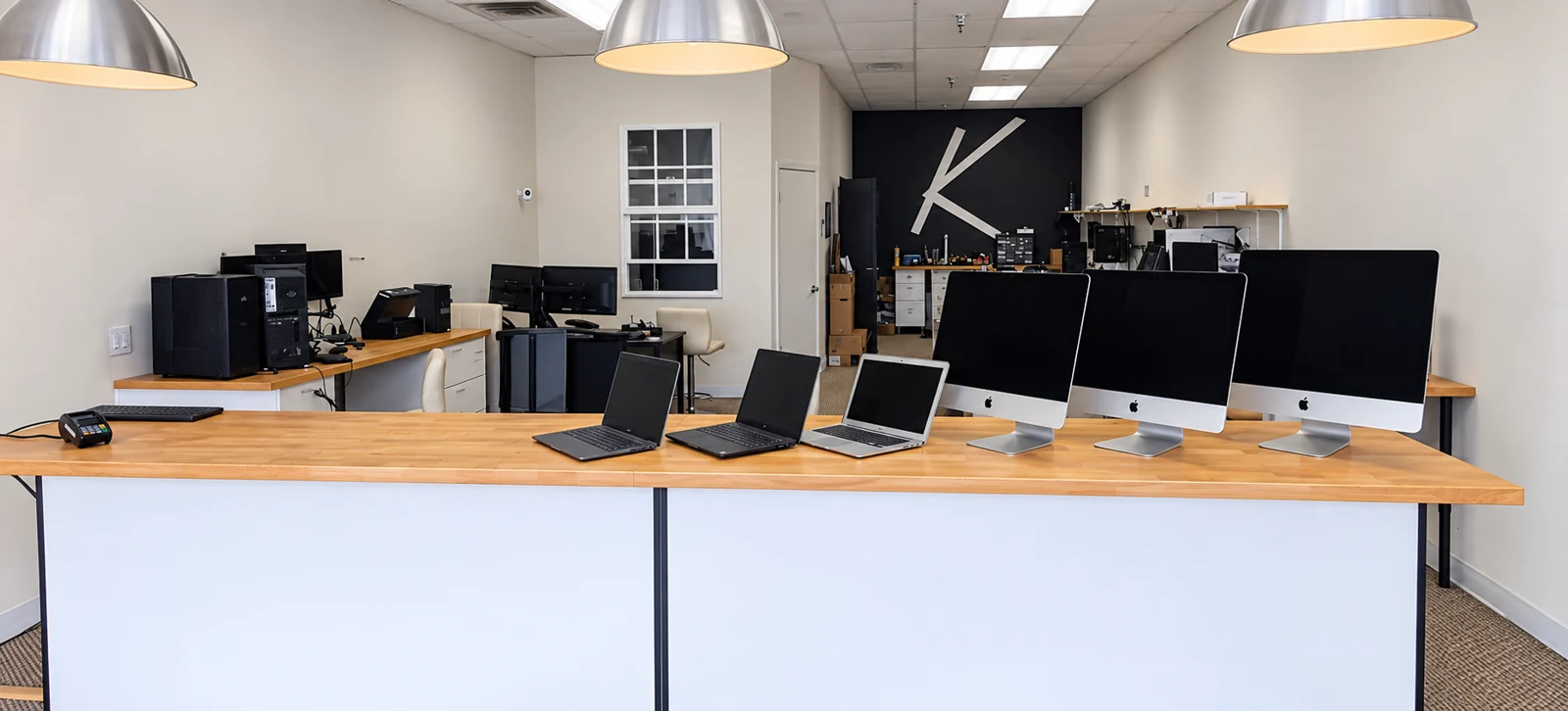 AI-retouched view of the Kevin’s Computer Service shop interior in Dana Point
